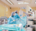 Urology team in an operating room preparing a ureteral stent placement procedure