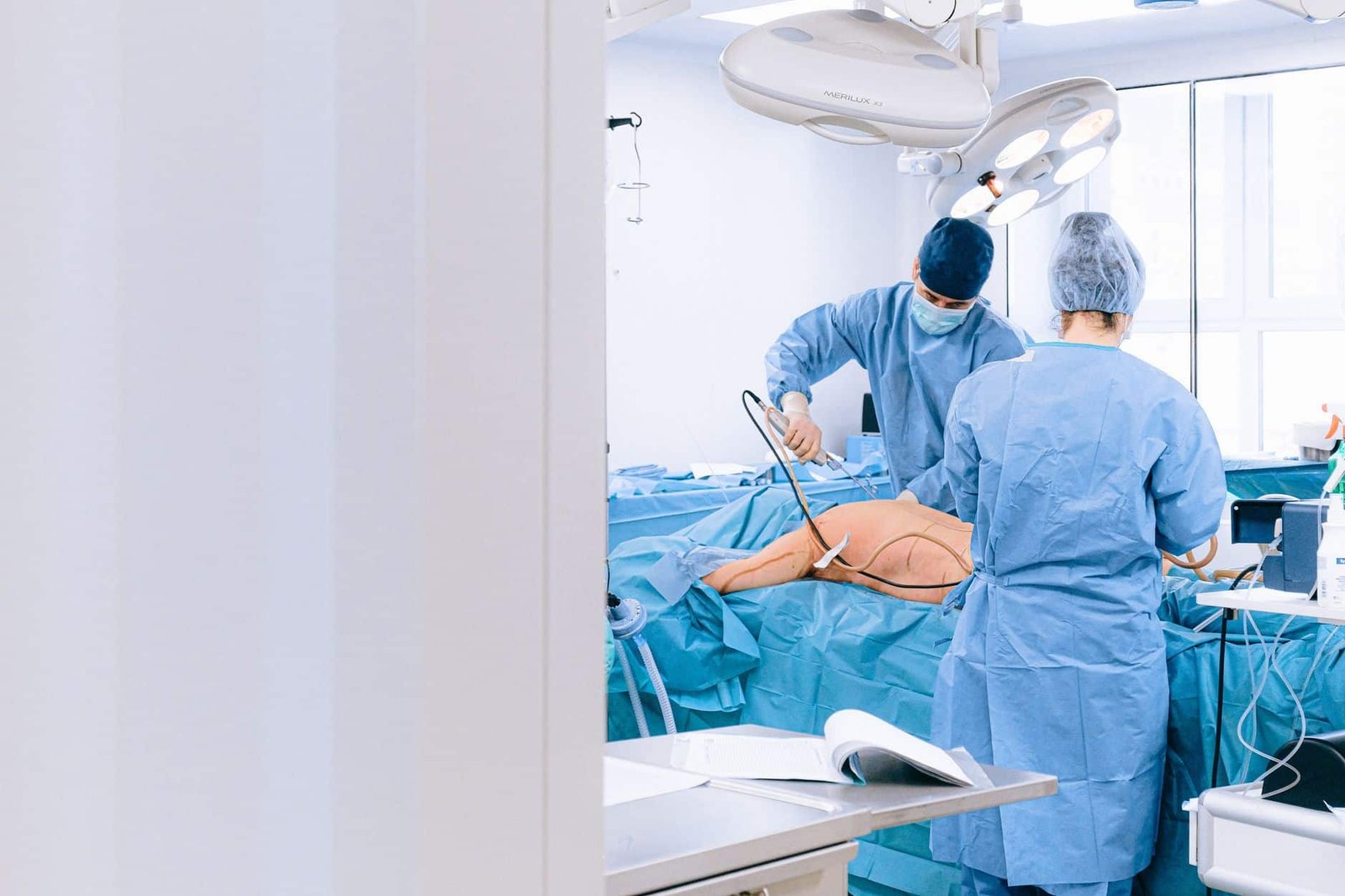 Urology team in an operating room preparing a ureteral stent placement procedure (2)