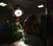 Surgical team performing percutaneous nephrolithotomy where a nephrostomy dilator set is used