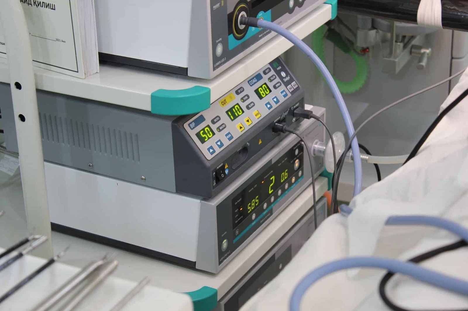 Close-up of an opened stone retrieval basket wire cage on a sterile tray