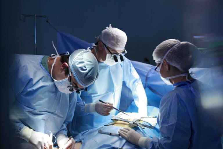 Urology team performing flexible ureteroscopy where ureteral access sheath sizes matter